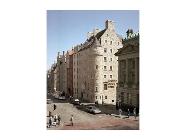 The Royal Mile hotel gives a Postmodern twist to the traditional Scottish castle design .