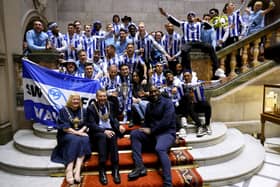 Sheffield Wednesday manager Darren Moore and his team celebrate their promotion to the Sky Bet Championship at Sheffield Town Hall following an open top bus parade. Sheffield Wednesday secured their promotion to the Championship after Josh Windass scored in injury time at the end of extra-time of the play-off final. Picture date: Wednesday May 31, 2023. PA Photo. See PA story SOCCER Sheff Wed. Photo credit should read: Richard Sellers/PA Wire.RESTRICTIONS: Use subject to restrictions. Editorial use only, no commercial use without prior consent from rights holder.
