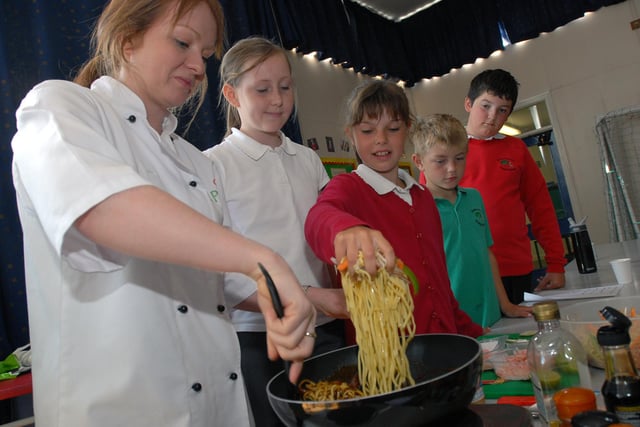 Expo chef Sarah McAllister is pictured cooking with pupils from the school 11 years ago. Remember this?