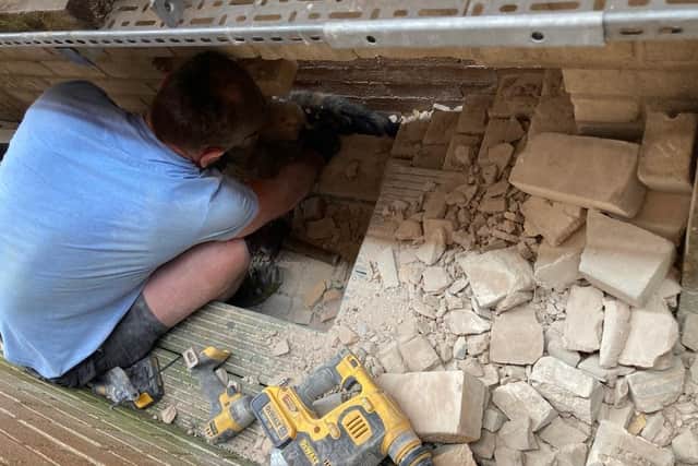 Meanwhile Mick and fellow neighbour Matthew Walker, who both have building backgrounds, began to dismantle Mick’s boundary wall to try to free Cassie.