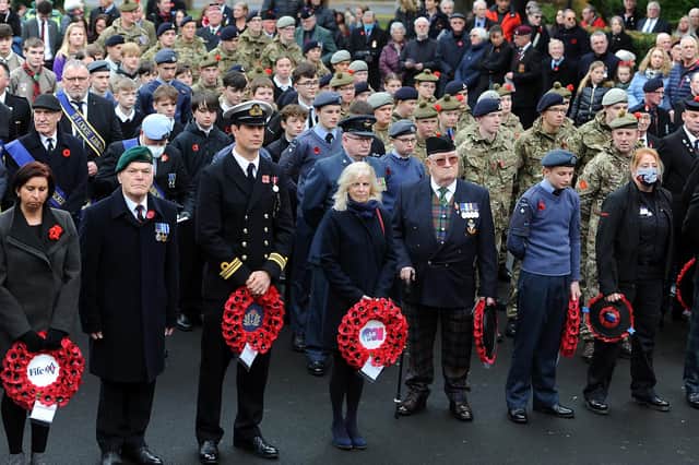 Dignitaries gather at the War Memorial, including Councillor Zoe Hisbent (left), Councillor Rod Cavanagh (second left), and l Michelle Sweeney (centre), who laid a wreath on behalf of  On Fife