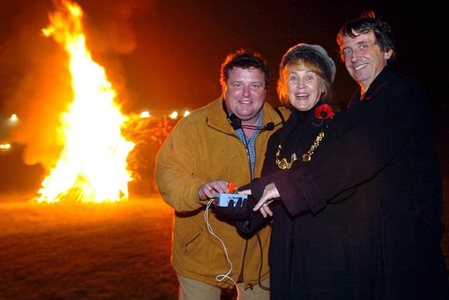 After dark at Don Valley Bowl.....The Lord Mayor of Sheffield Cllr Jackie Drayton and her Consort Ian Drayton along with organiser Scott Barton light the bonfire (November 5, 2006)