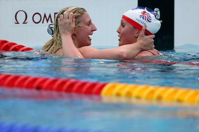 Rebecca Adlington is congratulated by Cassandra Patten on her victory in the Women's 800m Freestyle Final.