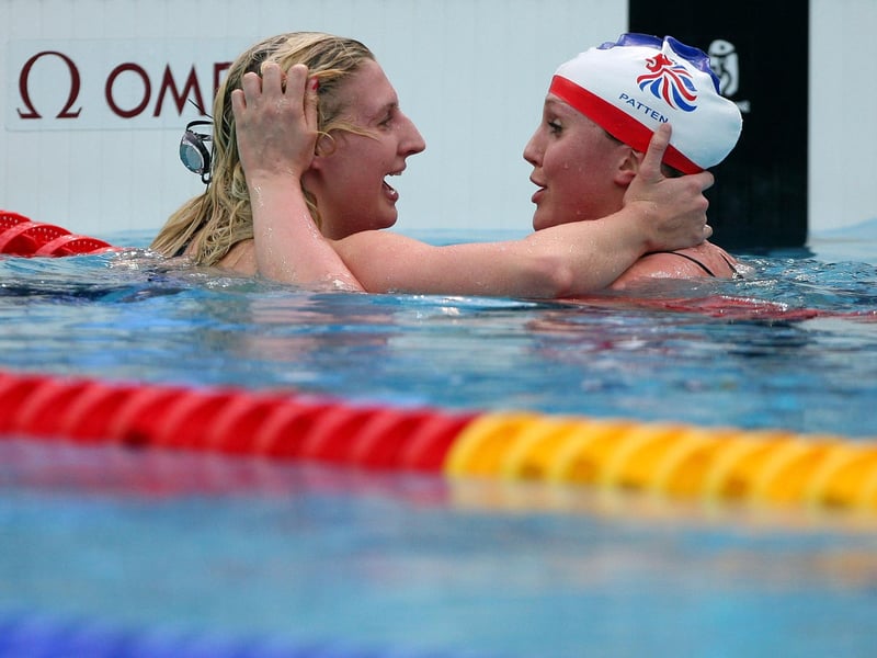 Rebecca Adlington is congratulated by Cassandra Patten on her victory in the Women's 800m Freestyle Final.