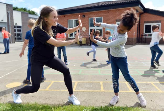 Royal Ballet dancer and Doncaster local Charlotte Tonkinson and David Pickering from The Royal Opera House lead a creative ballet workshop for the school children Southfield Primary School.
