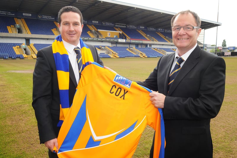 Paul Cox, Stags new manager, is unveiled by club chairman John Radford.