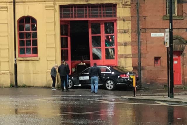 A car crashed into the National Emergency Services Museum in Sheffield after a collision at West Bar roundabout