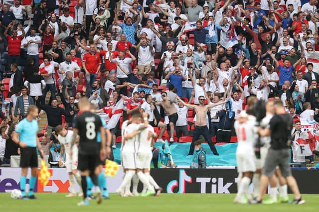 LONDON, ENGLAND - JUNE 29: England fans celebrate after victory in the UEFA Euro 2020 Championship Round of 16 match between England and Germany at Wembley Stadium on June 29, 2021 in London, England. (Photo by Catherine Ivill/Getty Images)