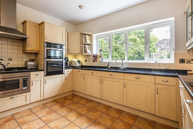 The kitchen space is large and part of the open plan area at the rear of the house.