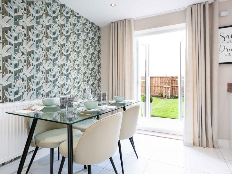 Dining area with French doors opening on to the rear garden