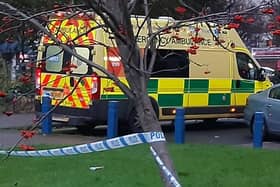 A woman pedestrian is critically ill after a collision with a car near the bend in the road near Greenacre School, Barnsley. File picture shows an ambulance and police tape.