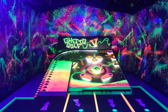 Golf Fang is a premium Sheffield indoor golf experience with whacky courses like a set that mimmicking a scene from the Jeremy Kyle Show, a Godzilla hand crushing an American-style police car and an aeroplane fuselage.