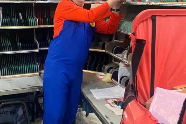 Andy Oates has been swapping out his post worker uniform for fancy dress this week to raise money for NHS staff in Sheffield.