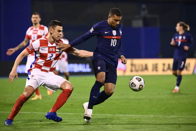 France's forward Kylian Mbappe (R) vies for the ball with Croatia's defender Filip Uremovic during the UEFA Nations League Group A3 football match between Croatia and France at the Maksimir Stadium in Zagreb: FRANCK FIFE/AFP via Getty Images