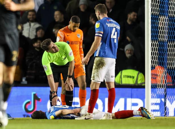 Shaun Williams of Portsmouth FC is subbed but later left the ground in a wheelchair with medics after injuring himself during the Sky Bet League One match between Portsmouth and Charlton Athletic at Fratton Park on January 31, 2022 in Portsmouth, England. (Photo by Robin Jones/Getty Images)