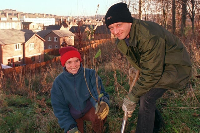 Sheffield Conservation volunteers, Katy Buers, 27 and John Merrill, 37,  plant a birch tree at the Philadelphia Park, overlooking the former Kelvin Flats site back in 1998