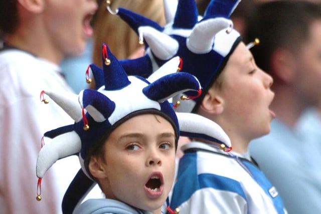 Young Owls supporters cheer on their side at Derby in May 2006.