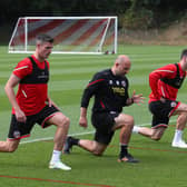 Sheffield United fitness coach Lee McMahon has had his work cut out of late treating injured stars including Ciaran Clark and Enda Stevens: Simon Bellis/Sportimage