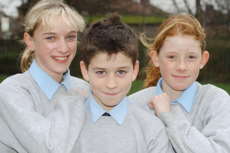 Amble Middle School cross-country runners, Stevie Goodfellow, Sally Briggs and Alistair Douglass.