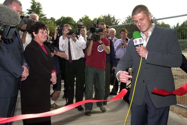 Film star and Sheffield United director Sean Bean pictured cutting the ribbon at the opening of the new Sheffield FM Academy at Sheffield United on Shirecliffe Road, August 30, 2002