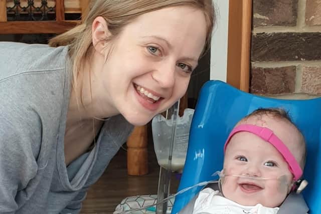 Mum Kathryn and Jessica, who was able to return home in September 2020