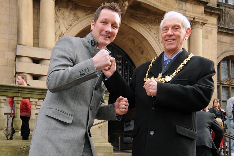 British, European, Commonwealth and IBF world light heavyweight boxing champion Clinton Woods squares up to the Lord Mayor of Sheffield Coun Graham Oxley after being inducted into Sheffield's Walk of Fame in January 2010