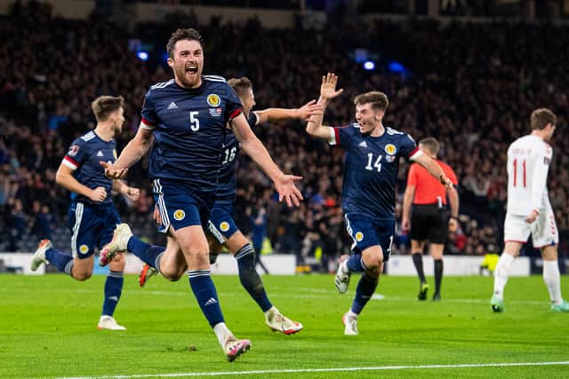 Scotland’s John Souttar celebrates after scoring to make it 1-0 during a FIFA World Cup Qualifier between Scotland and Denmark at Hampden Park, on November 15, 2021, in Glasgow: Ross MacDonald / SNS Group