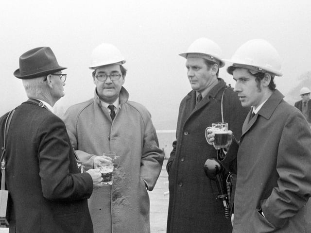 Can you spot any familiar faces as work begins?