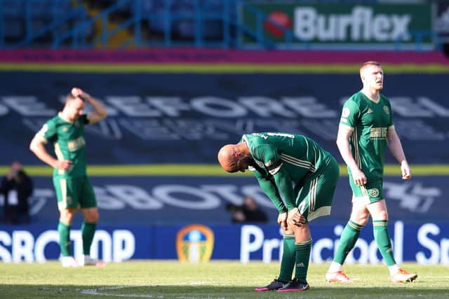 John Lundstram and David McGoldrick after United's defeat at Leeds: Simon Bellis/Sportimage