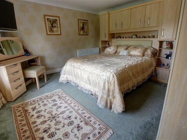One of the three bedrooms.