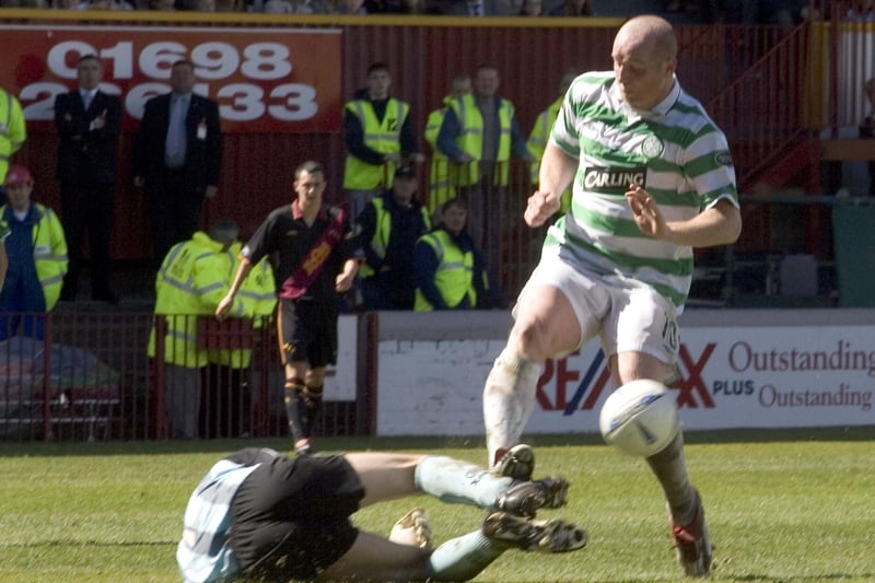 Celtic would pass up a number of opportunities to wrap up maximum points. Here, Motherwell goalkeeper Gordon Marshall saves at the feet of Welshman John Hartson in one of the key moments that resulted in O’Neill’s men blowing the title.