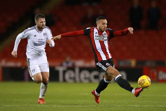 Samir Carruthers and Ollie Norwood during United's 5-4 defeat to Fulham in 2017: Simon Bellis/Sportimage