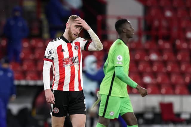 Oli McBurnie of Sheffield Utd looks on dejected at the final whistle during the Premier League match against Chelsea at Bramall Lane. Andrew Yates/Sportimage