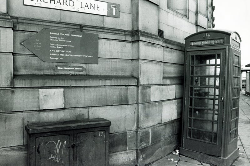 Phone boxes like this one, at Orchard Lane, Sheffield, in 1988 were famous for smelling of urine and often being out of order. Youngsters today have mobile phones instead so don't need to use them. Photo: Sheffield Newspapers.