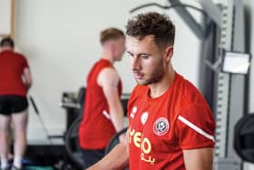 George Baldock hits the gym during Sheffield United's pre-season training camp in Portugal. Pictures: Sheffield United FC