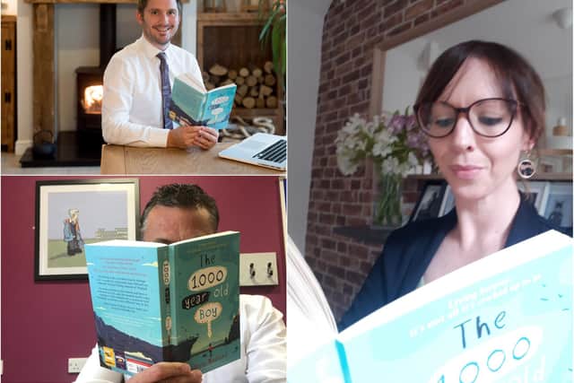 (L-R) Assistant Headteacher Sam Tipson, top, Headteacher Andy Ireland, and Assistant Headteacher Fiona Finch pictured reading the book which has been gifted to the new Year 7 pupils at Stocksbridge High School