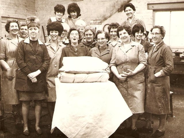 A worker enjoys her leaving presents at the Firth Vickers Test House, Weedon Street, in the early1960s.                                                   
Photo submitted by Mrs Patricia Henshaw