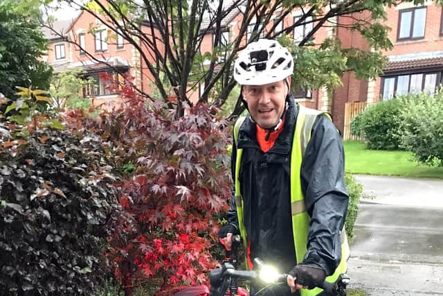 Andrew Norton of Wessex Archaeology after his rainy commute