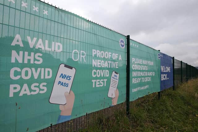 NHS Covid Passes will be required at some indoor and outdoor venues from December 15. (Photo by Steve Bardens/Getty Images)