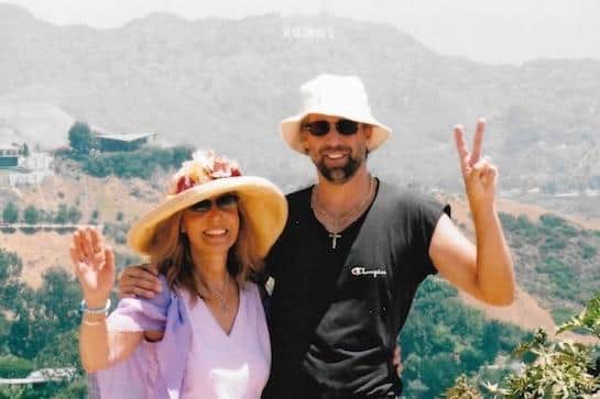 Dorothy Laflin, once known as Selket, posing in front of the famous Hollywood sign with film actor Peter Stormare, who has rerecorded the music of Sheffield music duo Ramases. Dorothy's late husband Barrington Frost renamed himself after the Egyptian pharaoh