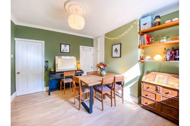This light and airy dining room is a good space and offers access to the basement where you will find a further room perfect for an office or playroom.
