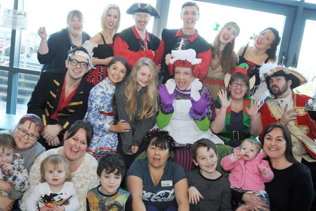 The cast of Peter Pan paying a visit to Chesterfield Royal in 2014.