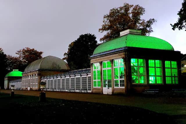 Sheffield Botanical Gardens pavilion lit up green in celebration of this year's Green Flag awards