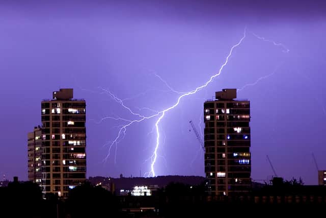 Lightning flashes in the night sky (Photo by Dan Kitwood/Getty Images)