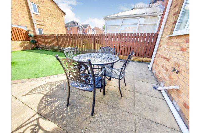 The back garden is enclosed and features a patio which offers a good alfresco dining space.