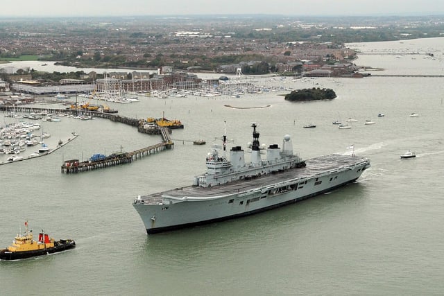 HMS Ark Royal leaves Portsmouth Harbour for what may be her last time in active service 9th November 2010. Picture: Malcolm Wells 0000-0175