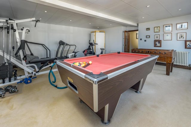 This reception room is currently used as a games room/gym.