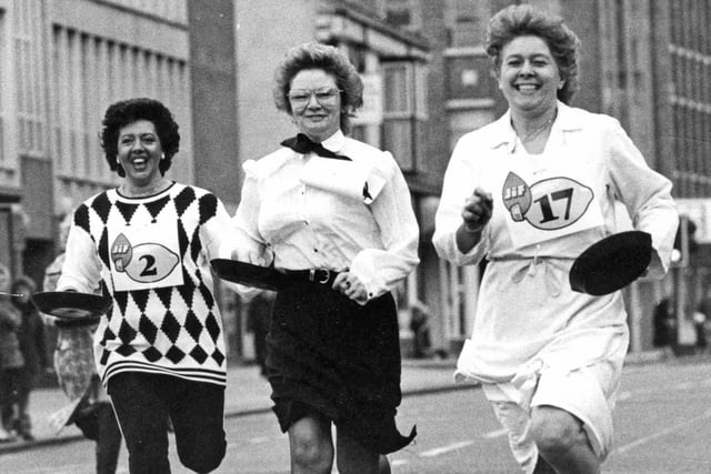 Competitors in the Mail Pancake Race in 1989.