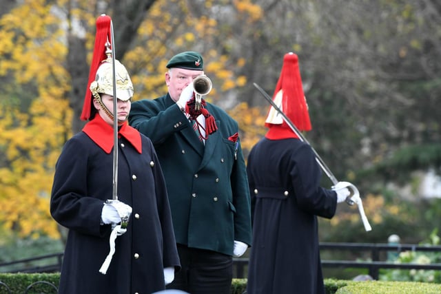 A bugler sounded The Last Post to mark the beginning of the two-minute silence.