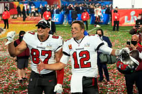 TAMPA, FLORIDA - FEBRUARY 07: Rob Gronkowski #87 and Tom Brady #12 of the Tampa Bay Buccaneers celebrate after defeating the Kansas City Chiefs in Super Bowl LV at Raymond James Stadium on February 07, 2021 in Tampa, Florida. The Buccaneers defeated the Chiefs 31-9. (Photo by Mike Ehrmann/Getty Images)
